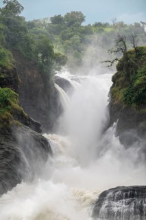 Masses of water tumble down over rocks, Murchison Falls, White Nile, Murchison Falls National Park,