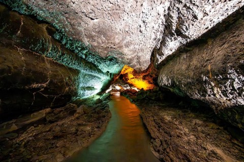Underground cave formed by lava flow, illuminated lava cave, Cueva de los Verdes, Lanzarote, Canary