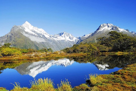 Key Summit with reflection of Mt. Christina, Fjordland National Park, World Heritage Site South