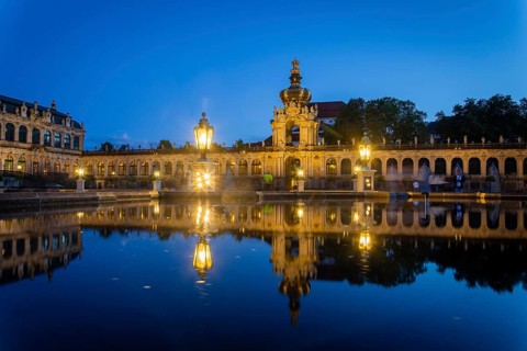 The reconstrated Zwingerhof, also pleasure garden, at the blue hour, Dresden, Saxony, Germany