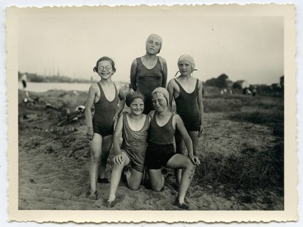 Swimwear, Five girls in bathing suits pose happily together on the beach, Bremen, Weser, 1936