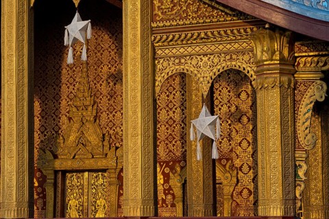 Sunrise, morning atmosphere at Wat Sibounheuang Buddhist monastery, Luang Prabang, Laos, Southeast