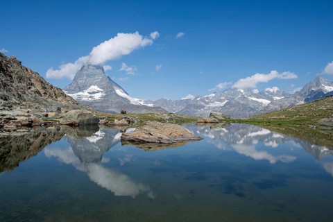 Matterhorn reflected in Riffelsee, Zermatt, Valais, Switzerland