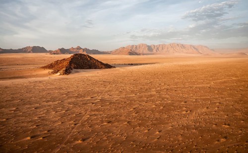 Aerial view, evening mood, empty Namib desert behind Naukluft mountains, Namib Naukluft Park,