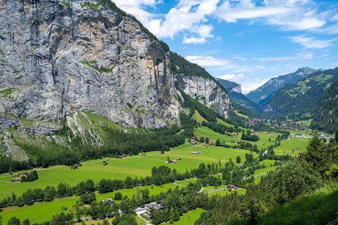 View of the picturesque valley of Lauterbrunnen with Staubbach Falls, mountain landscape, Bernese