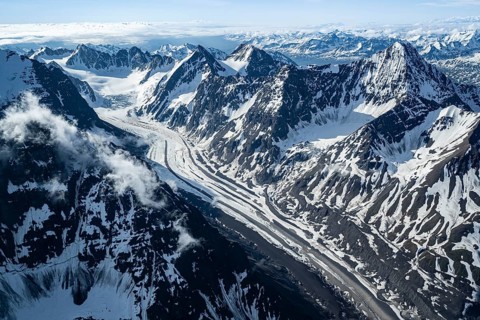 Snow and ice, epic mountains with glaciers, aerial view, Alaska Range, Denali National Park,