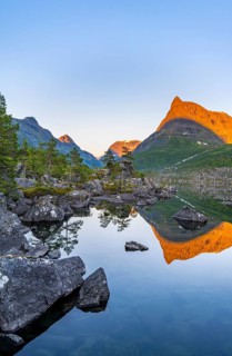 Picturesque mountain landscape in the Innerdalen high valley with Innerdalstårnet peak, mountain
