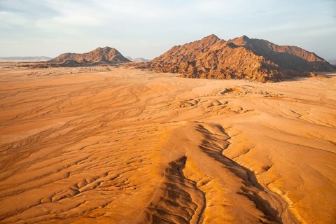 Aerial view, evening mood, canyons in the Namib Desert behind Naukluft Mountains, Namib Naukluft