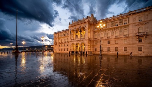 Illuminated square Piazza Unità d'Italia, Palazzo della Luogotenenza Austriaca or Palazzo Governo,