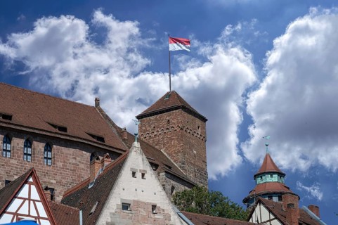 Waving flag of the Franks at Kaiserburg, Nuremberg, Middle Franconia, Bavaria, Germany