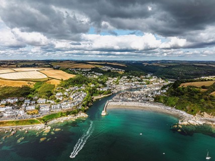 Beach and Cliffs over Looe Bay from a drone, Looe, River Looe, Cornwall, England, United Kingdom