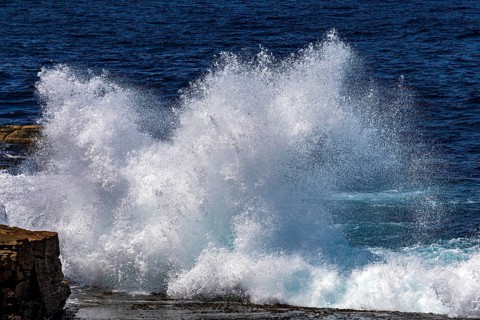 Waves crash into rocks on the coastline at Maroubra, Sydney, New South Wales, Australia