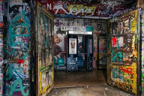 Graffiti with an old photo booth in the Fotografiska Museum, Berlin