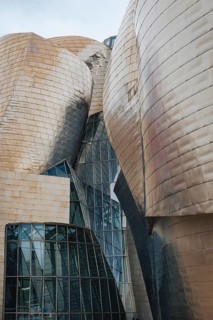 Exterior view of the Guggenheim Museum with titanium plates and glass elements in Bilbao, Spain