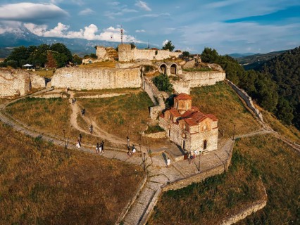 BERAT, ALBANIA - JULY 2, 2026: Aerial view of the ancient stone walls of Berat Castle enclosing