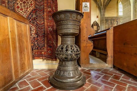 The bronze baptismal font of St. Margaret's Church in Medias or Medias, Transylvania, Romania