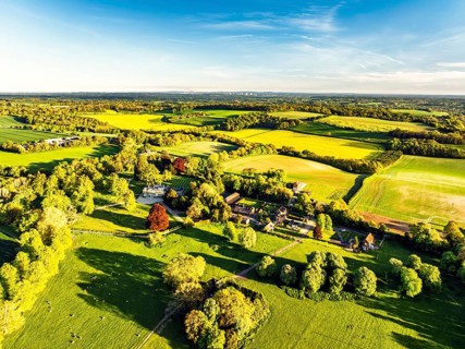 Fields and Farms over Horsebridge nad Stockbridge from a drone, Hampshire, England, United Kingdom