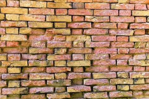 A brick house wall. Brick wall as background with free text space, Austria