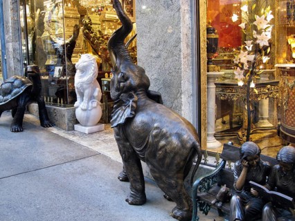 Bronze elephant statue, raised trunk, decoration, typical shop window in Chinatown, San Francisco,