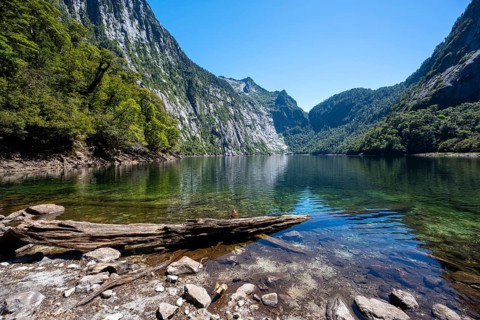 Laguna Triángulo with reflection between mountains, Parque Nacional Alerce Andino, Llanquihue, Los