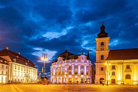 Fountain on Pia?a Mare Great Square, Brukenthal Museum, Sibiu City Hall and Holy Trinity Catholic