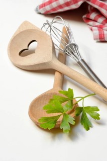 Cooking spoon and parsley, herb, Petroselinum crispum