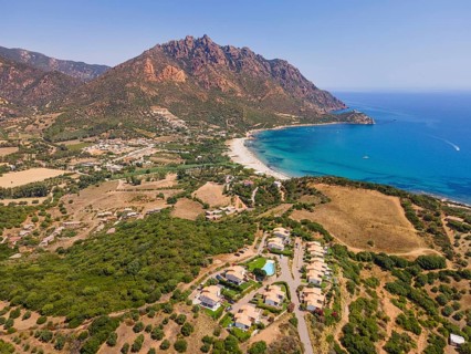 A cloudless blue sky shines over Foxi Manna beach, renowned throughout Europe, in the municipality