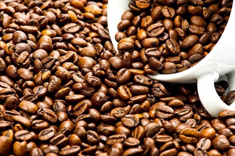 Coffee beans with cup