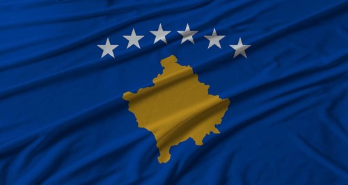 Kosovo flag waving. Flag of Kosovo with cloth texture