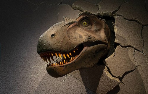 Interior view, exhibit skull of a Tyrannosaurus rex T-rex, dinosaur, carnivore, breaks through a