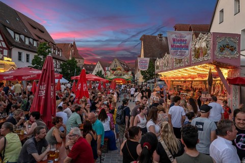 Visitor and candy stand at the Laufer City Festival, evening sky, Lauf an der Pegnitz, Middle
