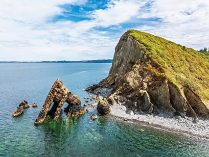 Blackchurch Rock and Cliffs over Mouthmill Beach from a drone, North Devon Coast, Devon, England,