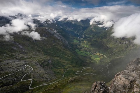 Famous curvy mountain road Fylkesvei 63 or Geirangervegen, which leads from Geiranger to the