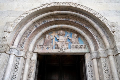 Decorated entrance portal of the Duomo di Santa Maria Assunta church, Gemona del Friuli,