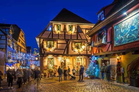 Colour-illuminated and Christmassy decorated half-timbered houses, blue hour, Christmas market,