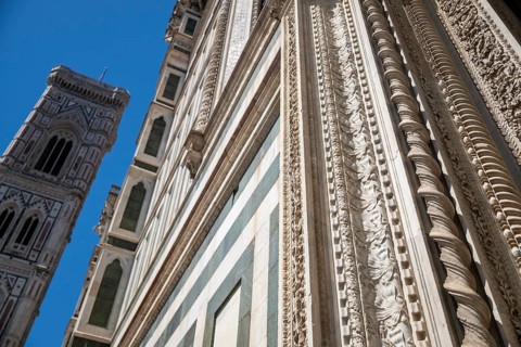 Detailed marbled columns and ornaments, decorative floral reliefs and textures, marble, façade,