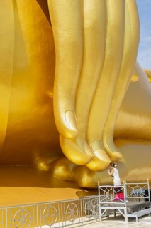 Thailand's largest Buddha statue (Luang Pho Yai), Thai woman, Wai gesture (traditional gesture of