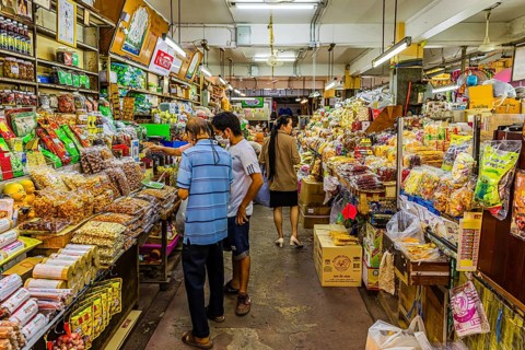 Customers in a grocery store, Kad Luang Warorod Market, Chiang Mai Thailand