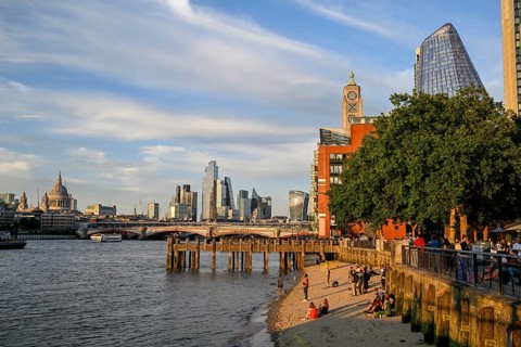 Sandy beach beach on the banks of the Thames near Gabriel's Wharf with views of Blackfriars Bridge