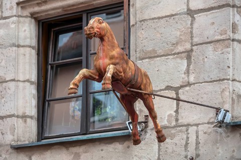 Antique rocking horse on a house wall, Obere Wörthstraße, Nuremberg, Middle Franconia, Bavaria,