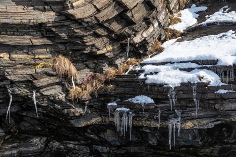 Icicles on rocks, Söröya, Finnmark, Norway, May 2019