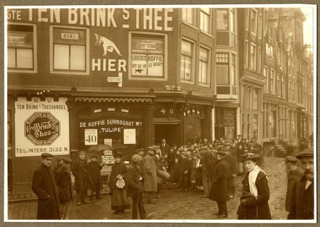 Amsterdam, the Netherlands, shops, tea shops, onlookers, people standing on a historic street in
