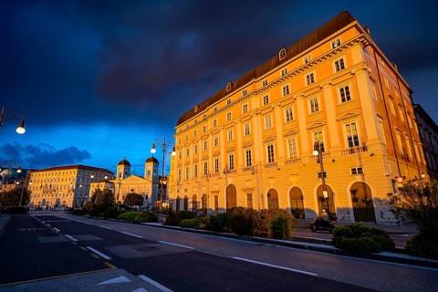 Magnificent buildings and palazzos on the Riva del Mandracchio seaside promenade in the evening