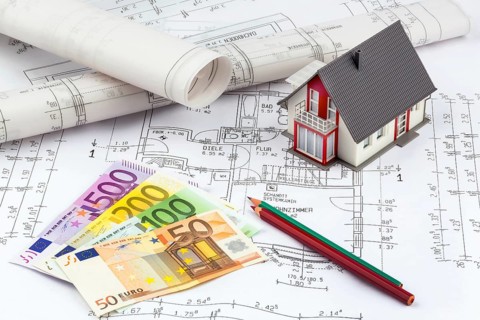 A construction plan for a residential building. Drawings and paintings by an architect, red pencil,