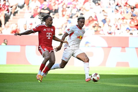 Tackle, Antonio Nusa in action for RasenBallsport RB Leipzig (RBL) (07) against Sacha Boey of FC
