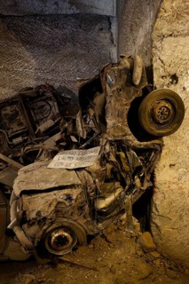 Rotten cars from the 1950s, car cemetery, Galleria Borbonica, Bourbon Gallery, Naples underground,