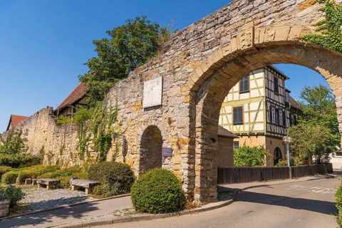 Grave gate with sundial, city wall around the historic old town of Schiller town Marbach am Neckar,