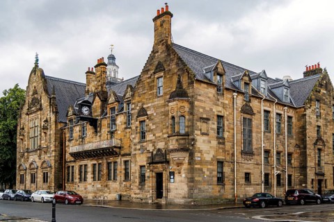 Sandstone Edwardian Renaissance style facade of the Pearce Institute, a community centre gifted to