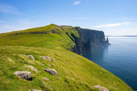 View of the steep cliffs of Liraberg, Skopun, Sandoy Island, Faroe Islands, Denmark