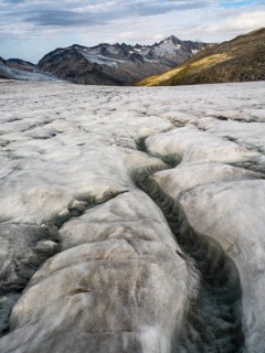 Glacier stream, glaciated mountains behind, Venedigerkees, Venice Group, Hohe Tauern National Park,